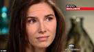 Amanda Knox defends moment she was seen kissing and smiling after.