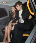 Keira Knightley and James Righton enjoy a cuddle in the cab after