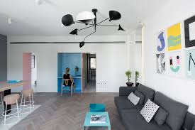 Colorful Tiny Apartment Design With Beige Herringbone Parquet Wood ...