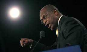 Herman Cain speaks during the