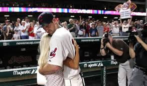 Cliff Lee hugs his wife,