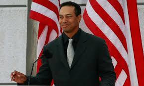 Tiger Woods gives a speech at