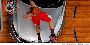 Blake Griffin dunks over car