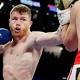 Canelo Alvarez routs Julio Cesar Chavez Jr.; Golovkin fight official 