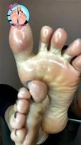 Nataly von gives a footjob and gets her feet covered in cum jpg x Covered feet