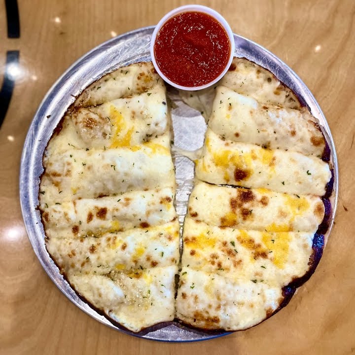 Fam's Brewing Co. featuring Famulari's Pizzeria by null