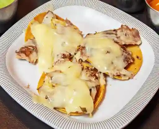 Tacos Manolo by null