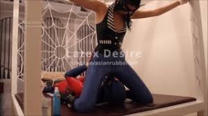 Latex clad mistress facesits and smother a slave jpg x Latex facesitting