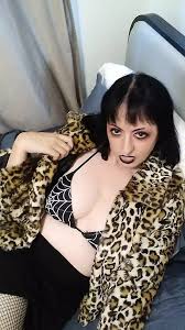 Spandex tight catsuit with leopard print hot milf in over knee boots posing on photoshoot jpg x Leopard print
