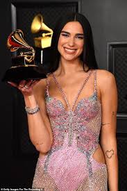 Dua lipa rewrites winter fashion rules with fur bra and coat jpg x Music video dua lipa