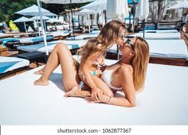 mom and daughter nudist|agefotostock