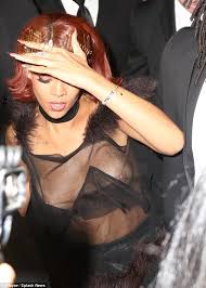 Rihanna reveals tan lines as she poses jpg x Rihanna tits