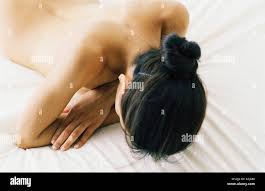 laying face down nude|