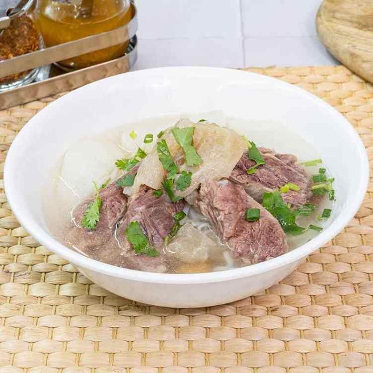 贵州苗家粉面 ( Xi Jiang Qian Hu) Beef Noodle Soup by null