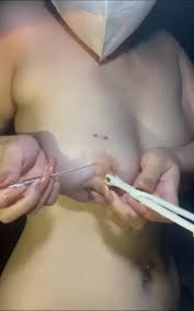 Penny gets her nipples pierced jpg x Nipple piercing