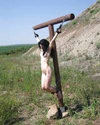 Crucified woman riding wooden horse jpg x Crucified women