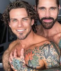 Tattooed gay porn stars chris damned and nick milani fuck bareback in a sling in “damned if you do” upgayporn jpg x Tattooed gay