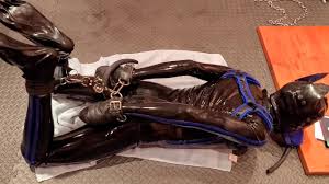 Slave in yellow latex vibrated jpg x Rubber bondage slave