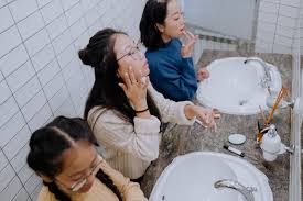 teenagers bath girls|Teenage Girls Applying Makeup In Bathroom High-Res Stock Photo - Getty  Images