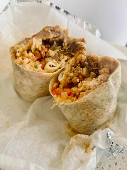 Tacos vs. Burritos Cantina by null