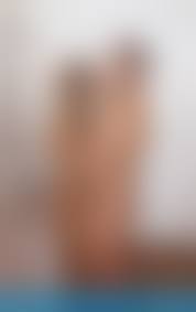 showering nude|Nude female sitting in shower, eyes … – License image – 70358465 ❘  lookphotos