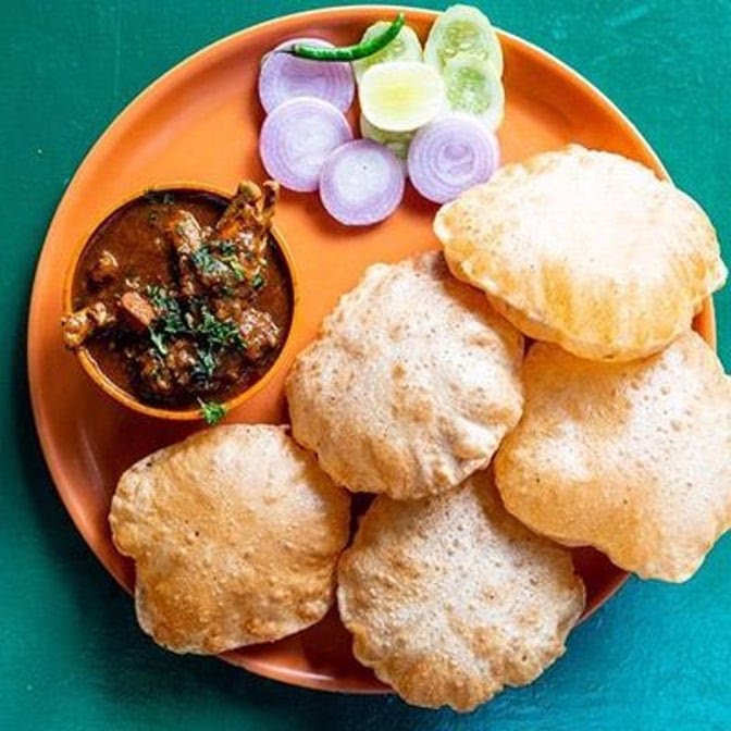 Indian Cravings Restaurant & Bakery by null