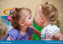 two little girls kissing|Two Little Girls Kissing Affection — Stock Photo © PantherMediaSeller  #339623748