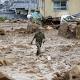 At least 27 dead after torrential rain triggers landslides in Japan