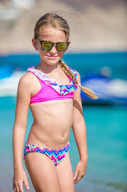 little girl bikini|Cute little girl in swimwear making heart figure gesture ...