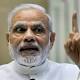 India defies EM sell-off as cash curb triggers bond rush 