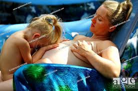 mom daughter nudism|Mother and Daughter on the Beach. Photo Stock Image - Image ...