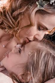 moter daughter oiss|Close up of black mother and daughter kissing Stock Photo - Alamy