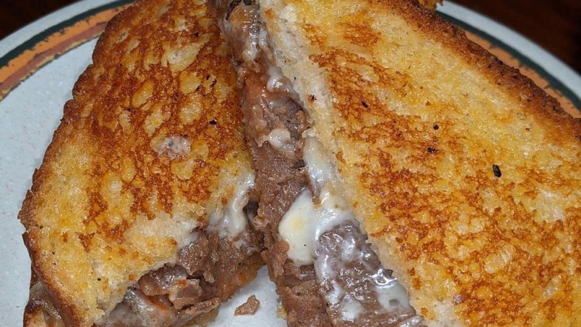 Quatro's Deep Pan Pizza by null