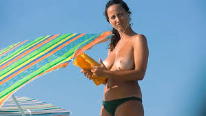 Gorgeous young nudist brunette caught a voyeur having fun at the beach jpg x Nudist beach voyeur