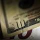 Euro surges on Draghi comments, dollar slips 