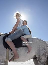 daugther sit and riding|