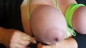 Huge tits blonde in device bondage jpg x Tit bondage