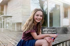 preteen nude little girls|Young girl with clean skin and Nude makeup close-up on grey isolate black  and white image Stock Photo | Adobe Stock