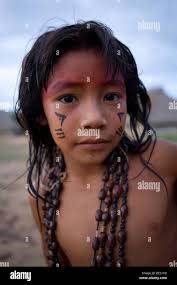 xingu child|Children of the Xingu Indian go to school built in the village by the  ministry of education. It is tradition to go in traditiona Stock Photo -  Alamy