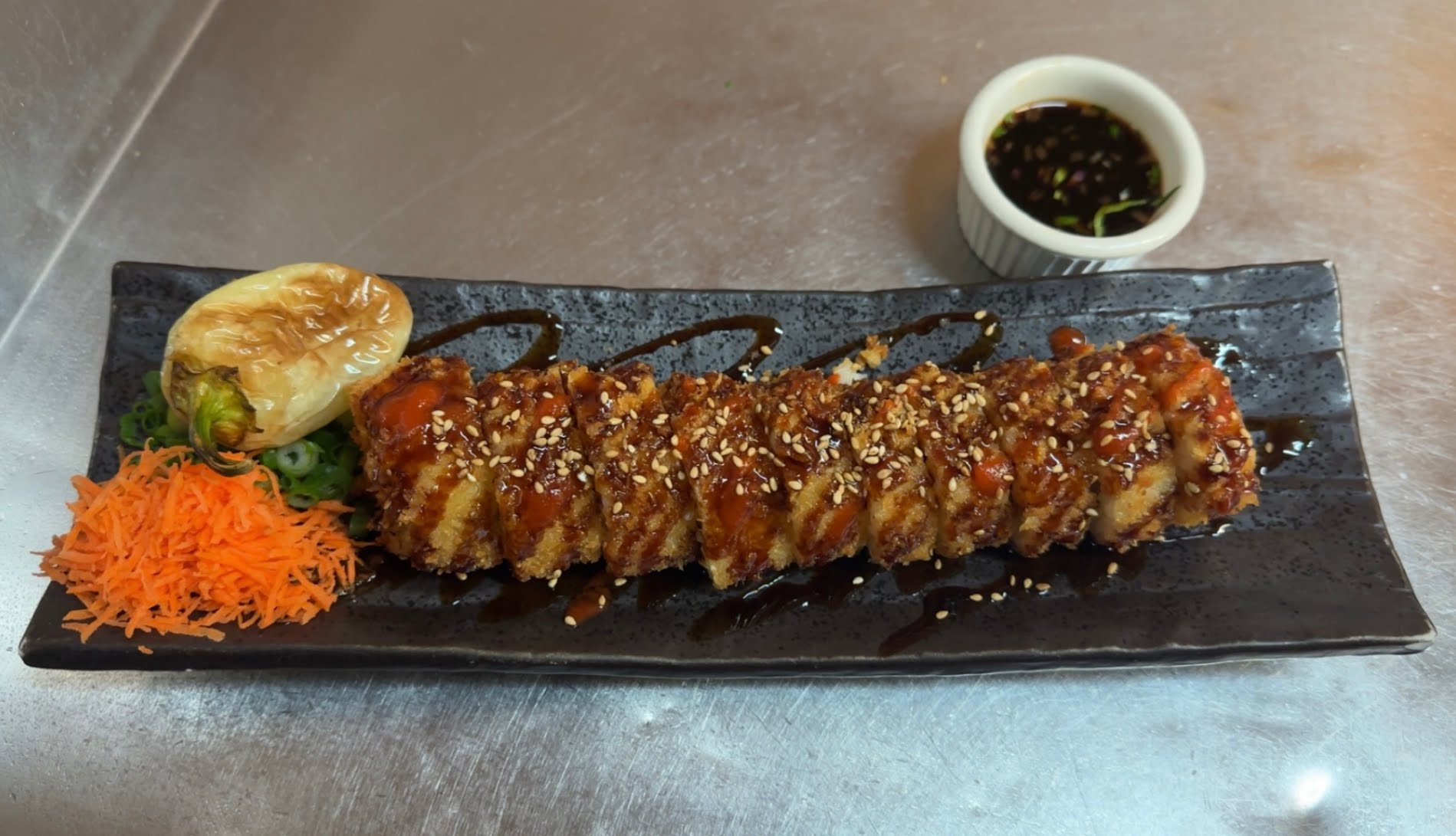 Mariscos y Sushi Los Tomateros by null