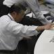 Asia stocks sway before US jobs report, dollar nurses losses 