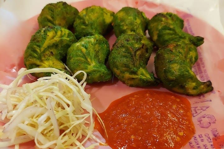 Suraj lama momos by null