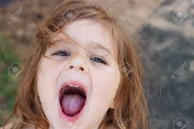 child girl open mouth|A child girl open her mouth and show her tounge Stock Photo - Alamy