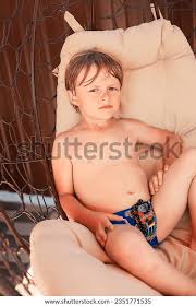 young little naked kid boys an girls|Young boy naked nude or bare sitting down Stock Photo - Alamy