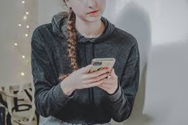 Beautiful young woman using mobile device at home in lingerie evjwl sexting text jpg x Sexting examples for her