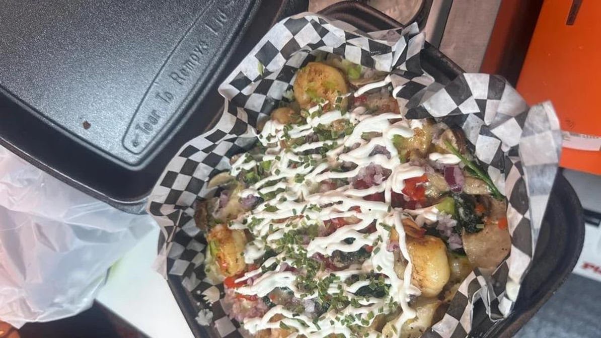 Spuds Loaded Baked Potatoes by null