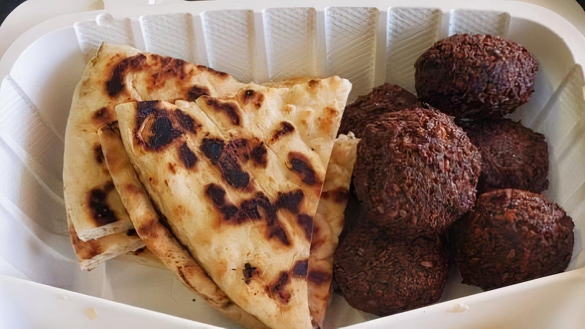 Pita On The plaza by null