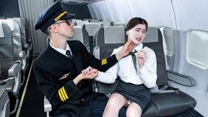 A blonde is in the plane and she watching a couple fucking jpg x Airplane fuck