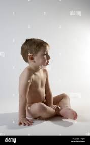 boy child nude |Young boy naked nude or bare sitting by the sea in Saronida Greece Stock  Photo - Alamy