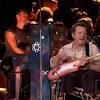 Michael J. Fox Riffs with Coldplay During Glastonbury Set